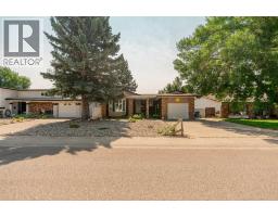 <div class="price">$489,000</div> 42 Honeysuckle Road N<br>Lethbridge, Alberta<br><div class='bed_bath'>5 Bed | 3 Bath</div>