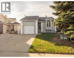 <div class="price">$425,000</div> 55 Assiniboia Road W<br>Lethbridge, Alberta<br><div class='bed_bath'>4 Bed | 2 Bath</div>